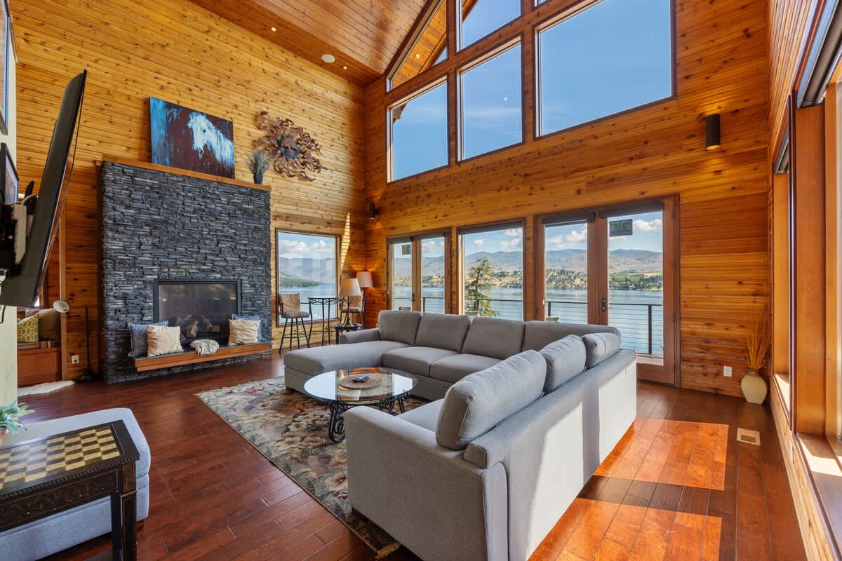 Large Open Living Area with Modern Stone Gas Fireplace